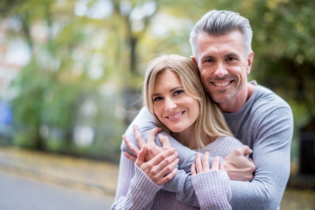 Happy mature couple after peptide therapy at our Albuquerque clinic